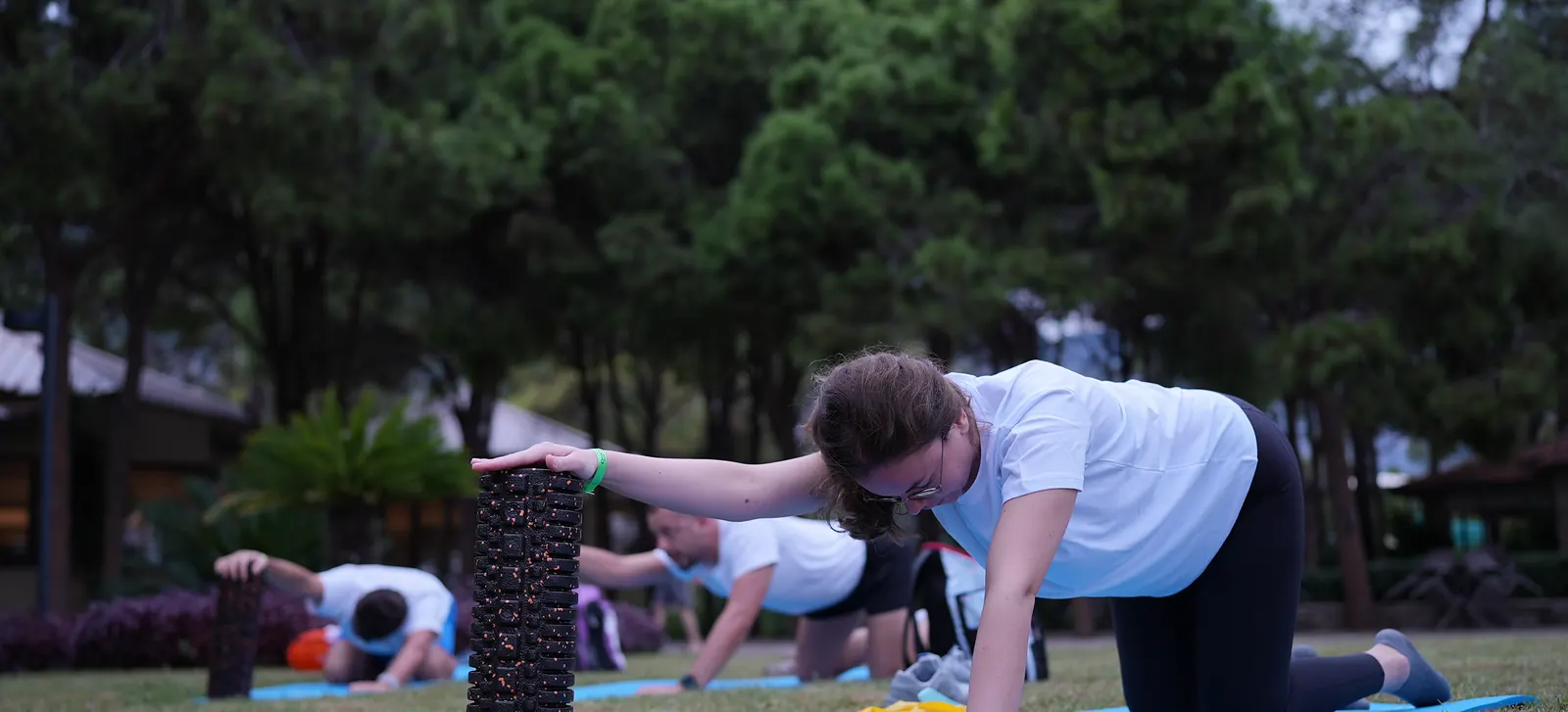 October 2026, Kemer: back and shoulder work with a foam roller on the lawn.